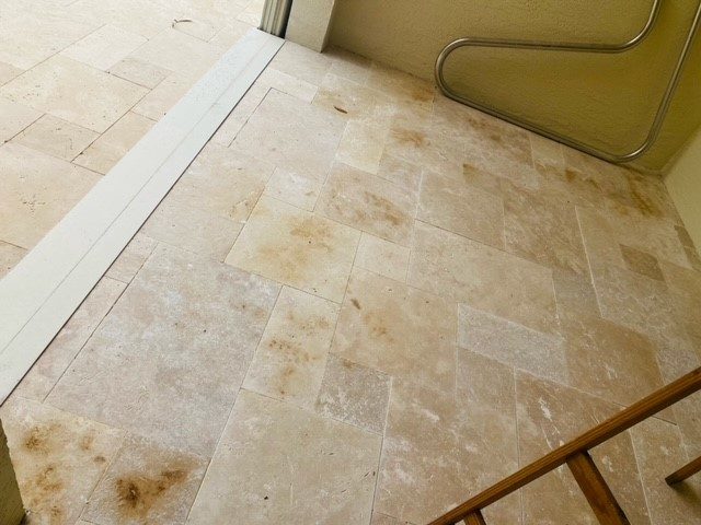 Ivory Travertine paver with iron staining
